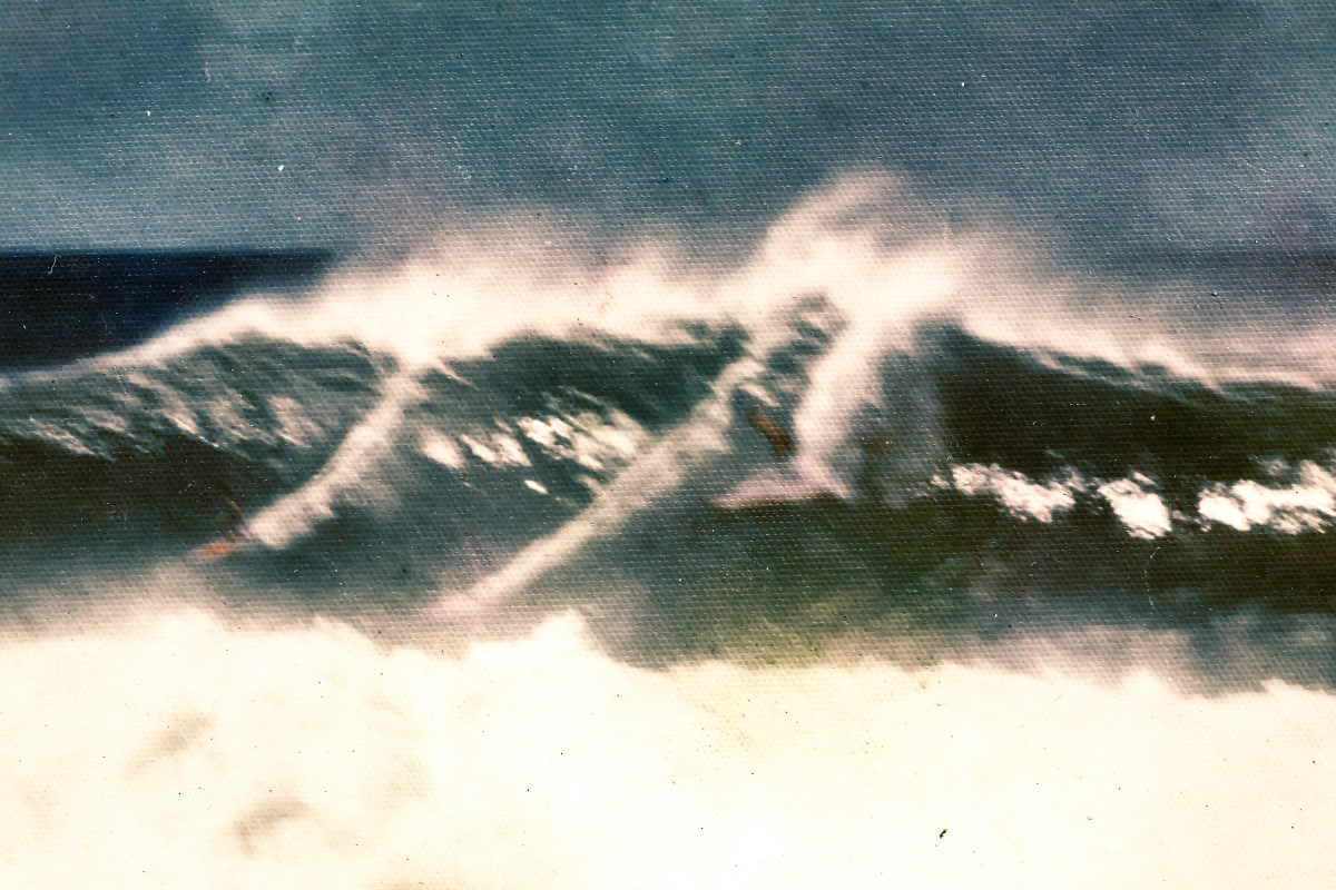 James MacLaren (to the right) at Waimea Bay, Hawaii, in the early 1970’s, spinning out in free-fall during a take-off attempt, not too many seconds before taking a bounce off the lava-rock bottom in some fairly deep water. James MacLaren (to the right) at Waimea Bay, Hawaii, in the early 1970’s, spinning out in free-fall during a take-off attempt, not too many seconds before taking a bounce off the lava-rock bottom in some fairly deep water.